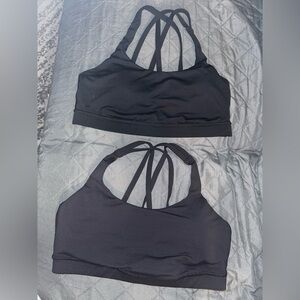 2 LULULEMON SPORTS BRAS. One is a size 8 & one is a size 10. Removable pads.